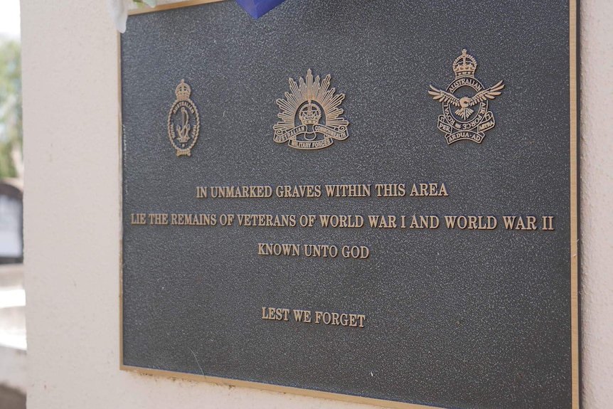 A plaque declaring a site containing unmarked graves of Australian war veterans
