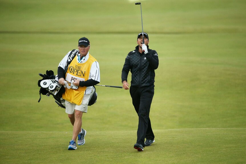 Jason Day reacts on 18th hole at British Open