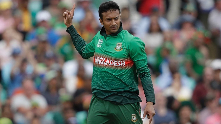 Shakib Al Hasan points to the sky with one hand, and the floor with another