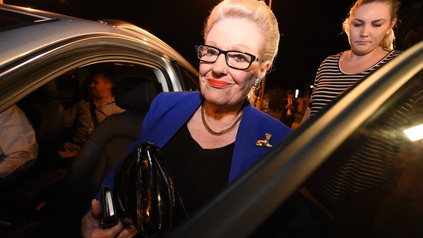 Bronwyn Bishop leaving the meeting