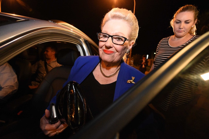 Bronwyn Bishop leaving the meeting