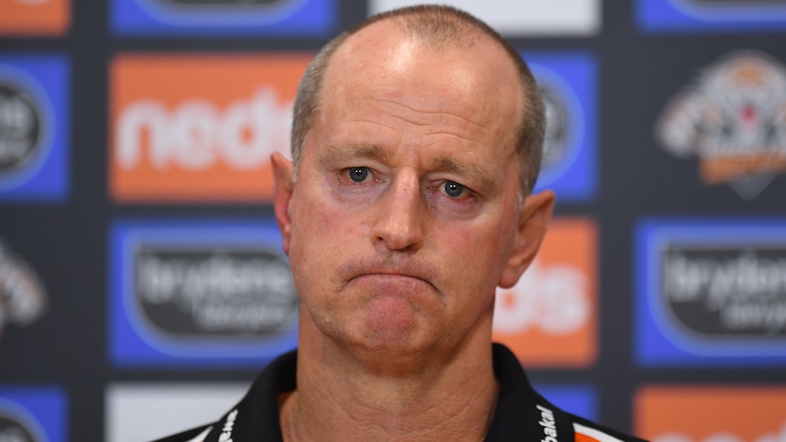 The Wests tigers NRL coach looks towards reporters during a media conference in 2021.