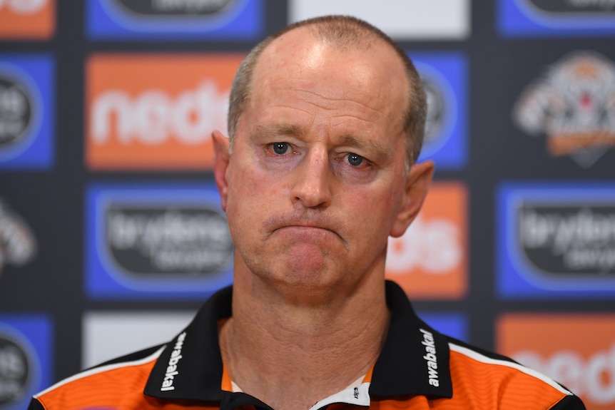 The Wests tigers NRL coach looks towards reporters during a media conference in 2021.