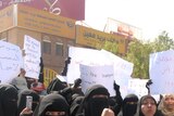 Students at Sanaa University protest the woman's arrest.