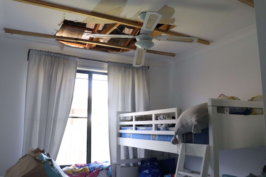 The damaged ceiling of a child's bedroom in Springfield Lakes after a hail storm