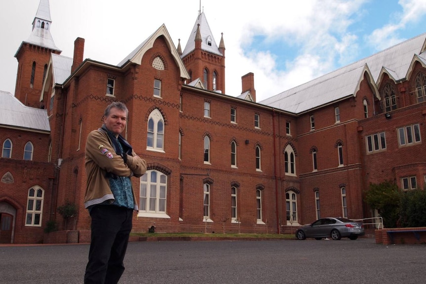 Jonathan Flynn outside Saint Stanislaus