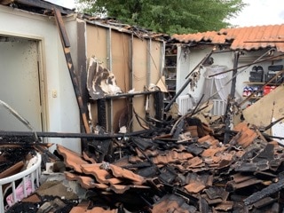 Roof tiles in amongst debris from the fire in one of the badly effected rooms.