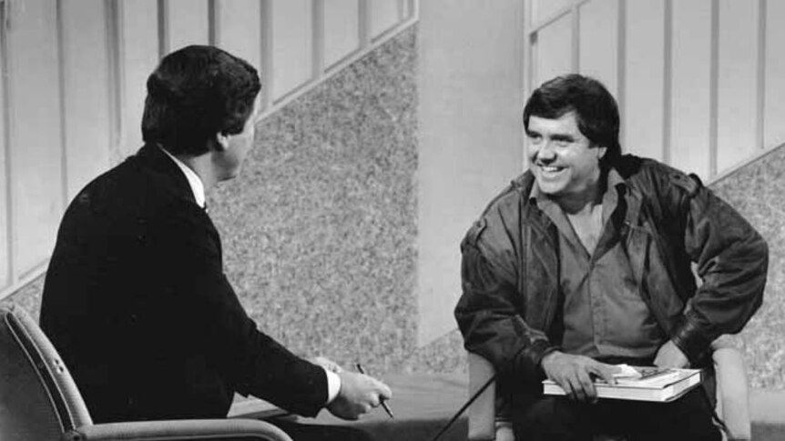 Black and white photo of Ray and Peter on a TV Set.
