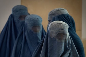 Afghan women in burqas wait in line at a polling station in Kabul (Getty Images/Paula Bronstein)