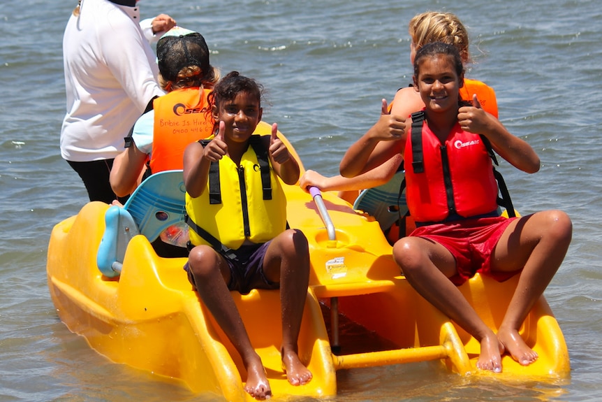 Students took turns at paddling paddle boats out into the channel near Bribie Island.
