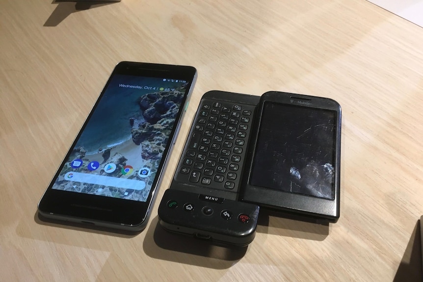 Google's new Pixel 2 phone sits next to an older smart phone.