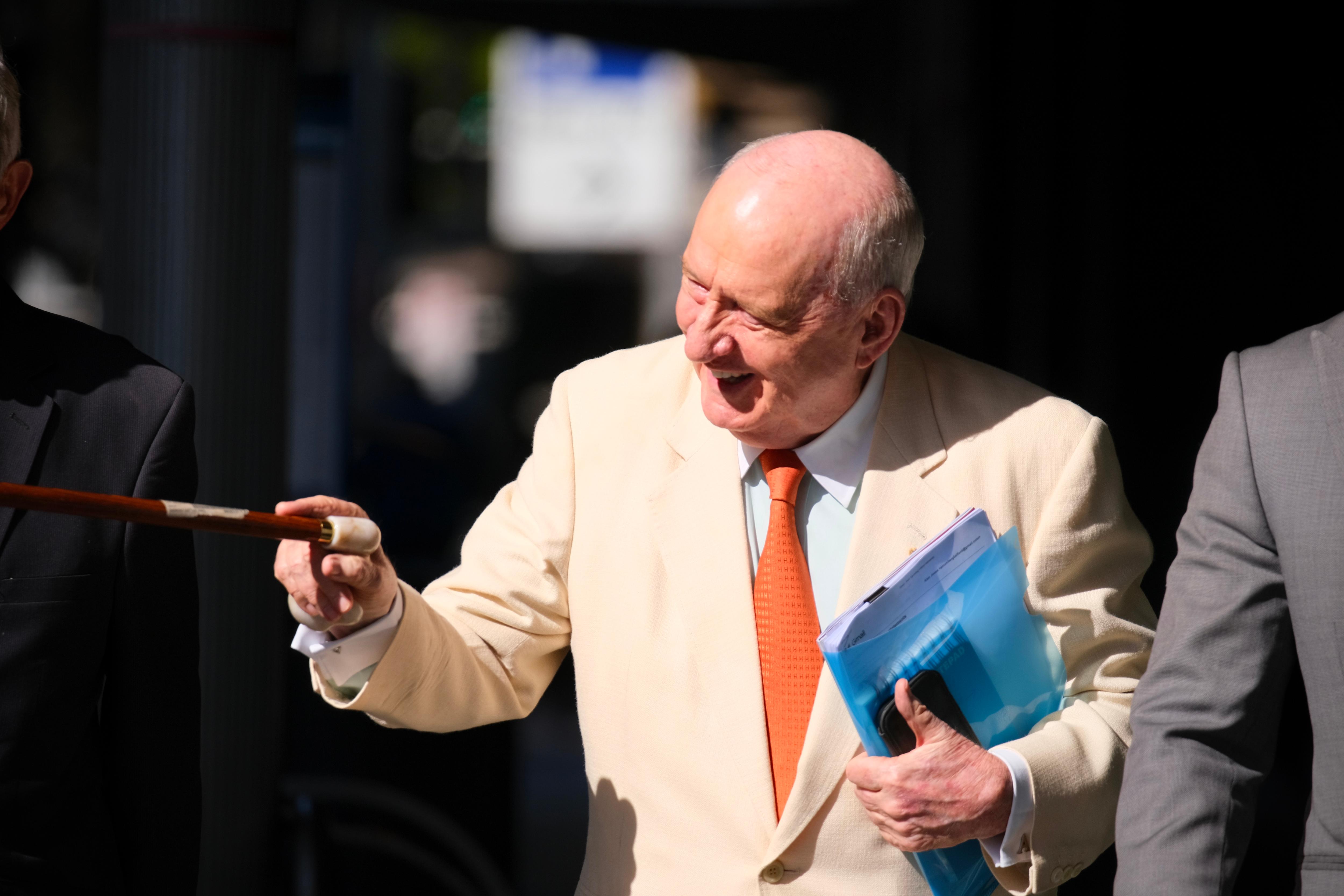Ex-politician didn't see Alan Jones kiss prominent athlete, trial hears