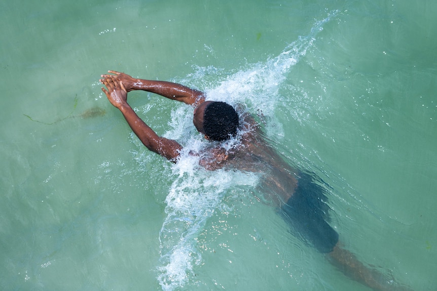 A swimmer at an Adelaide beach. 