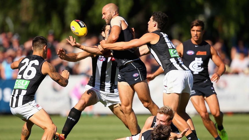 Judd fights for possession for Carlton