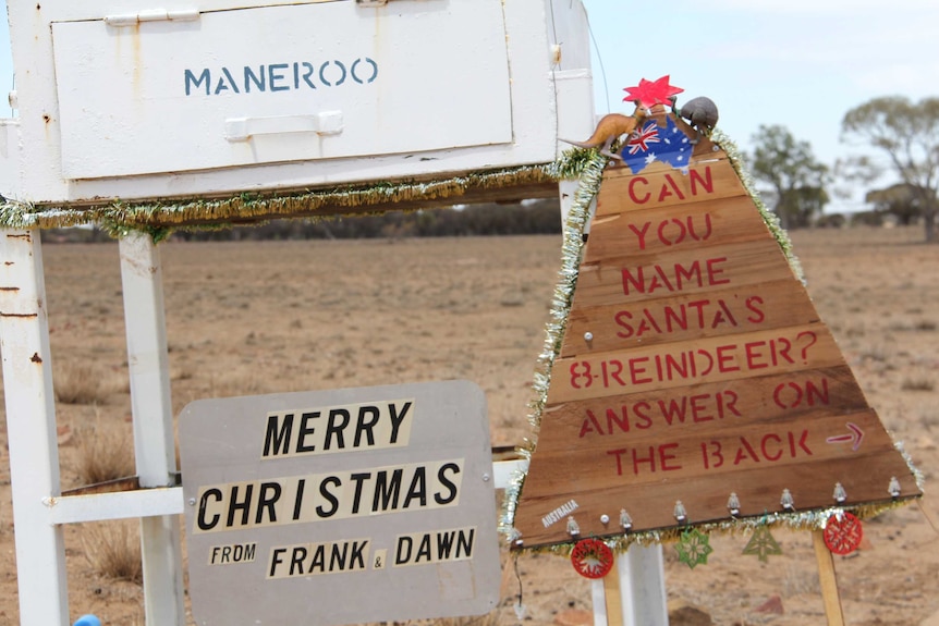 A rural letterbox, with Christmas greetings from Frank and Dawn Brown.