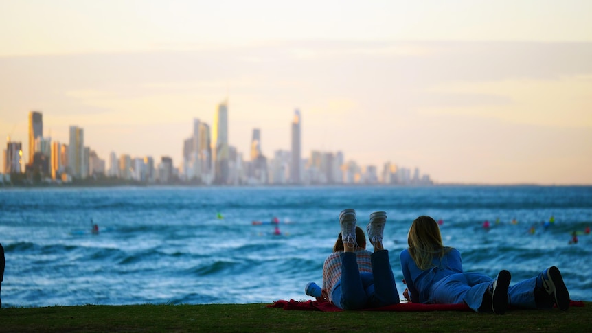Two girls looking at Surfers Paradise skyline