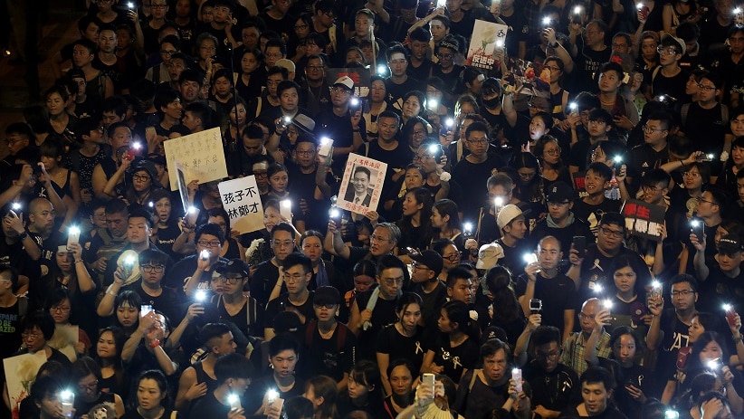 Protesters attend a demonstration demanding Hong Kong's leaders to step down.