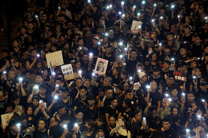 Protesters attend a demonstration demanding Hong Kong's leaders to step down.