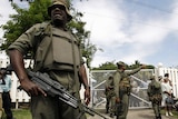 Fijian soldiers patrol then prime minister Laisenia Qarase's home on December 5, 2006.