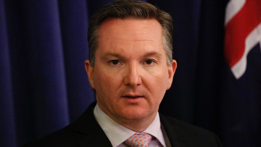 Chris Bowen speaking to the audience