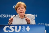 Angela Merkel delivers a speech during an election campaign.
