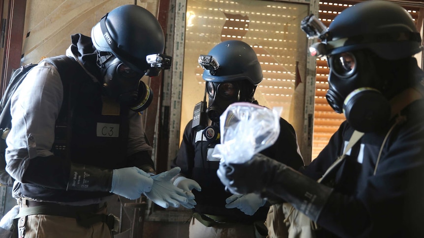 A UN experts at site of alleged chemical weapons attack in the Damascus August 2013