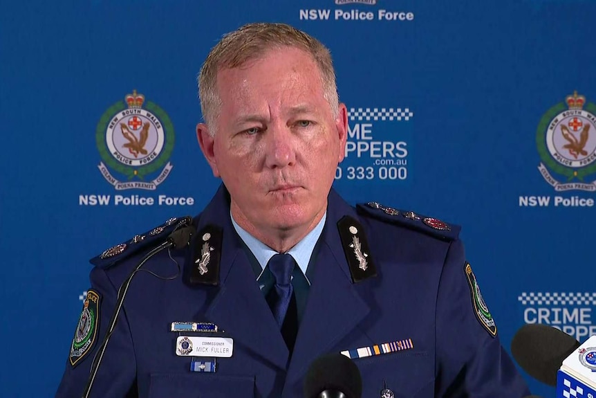 A policeman at a press conference