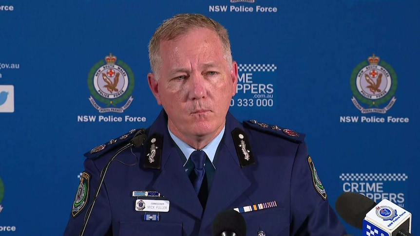 A policeman at a press conference