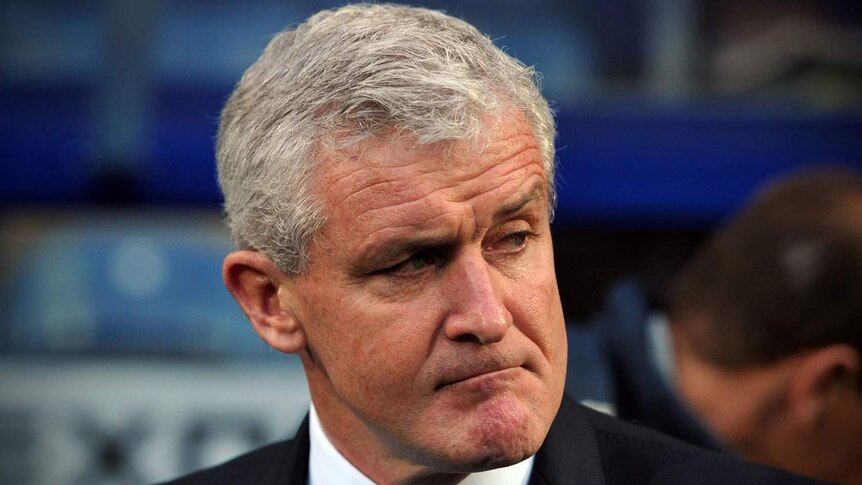 QPR manager Mark Hughes attends the Premier League match between QPR and Southampton.