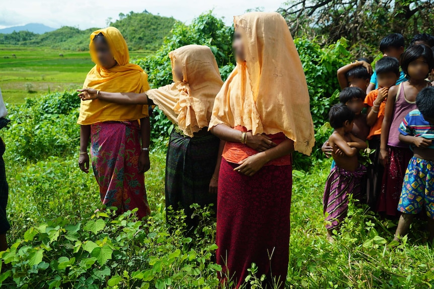 Women and children gather in Myanmar