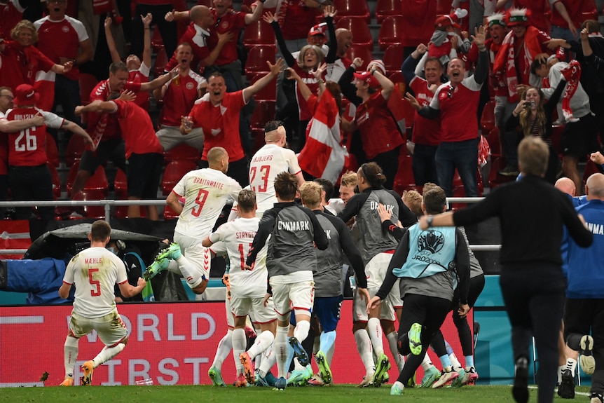 Danish players, fans, celebrate Andreas Christensen's goal