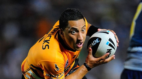 Leading by example: Benji Marshall skips away on a burst for the Tigers.