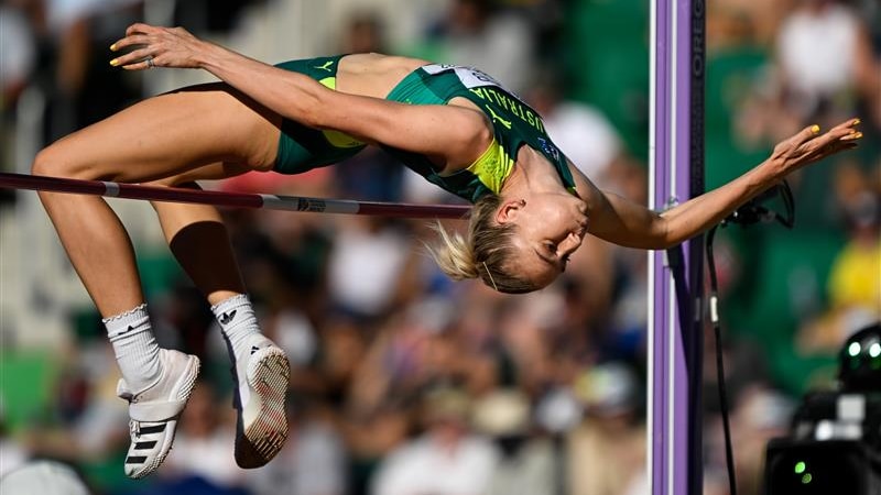Australia's Eleanor Patterson arches her back as she goes over the bar in the women's high jump.