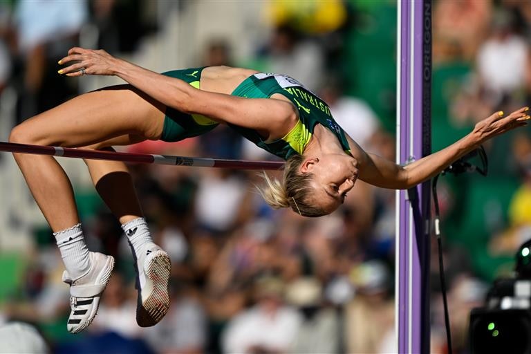 Australia's Eleanor Patterson arches her back as she goes over the bar in the women's high jump. 