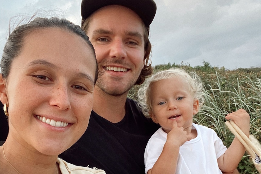 Nicholas and Sophie Pearce with their daughter.