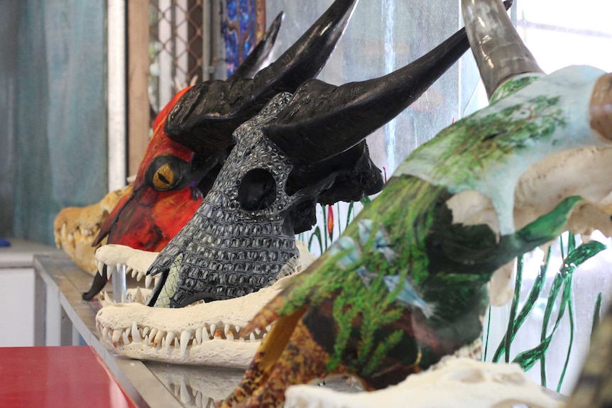 A line of painted animal skulls.