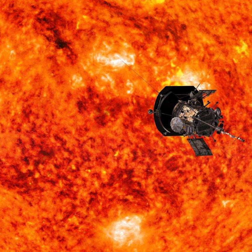 A spacecraft travels towards the sun.