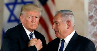 US President Donald Trump shakes hands with Israel's Benjamin Netanyahu