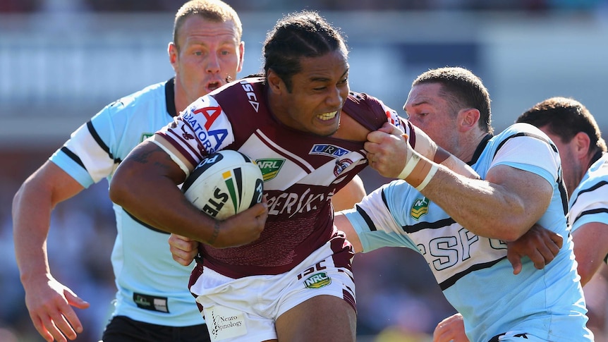 Steve Matai tackled during Manly's round six, 2013 match against Cronulla.