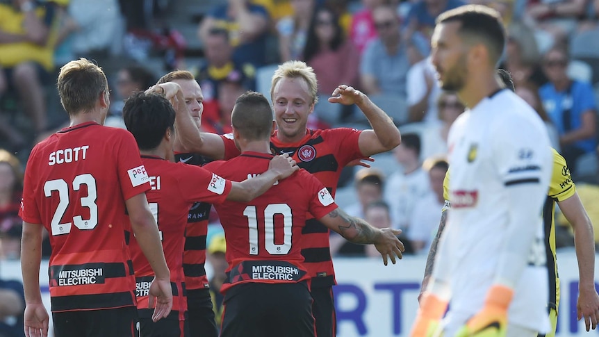 Wanderers celebrate a goal against the Mariners