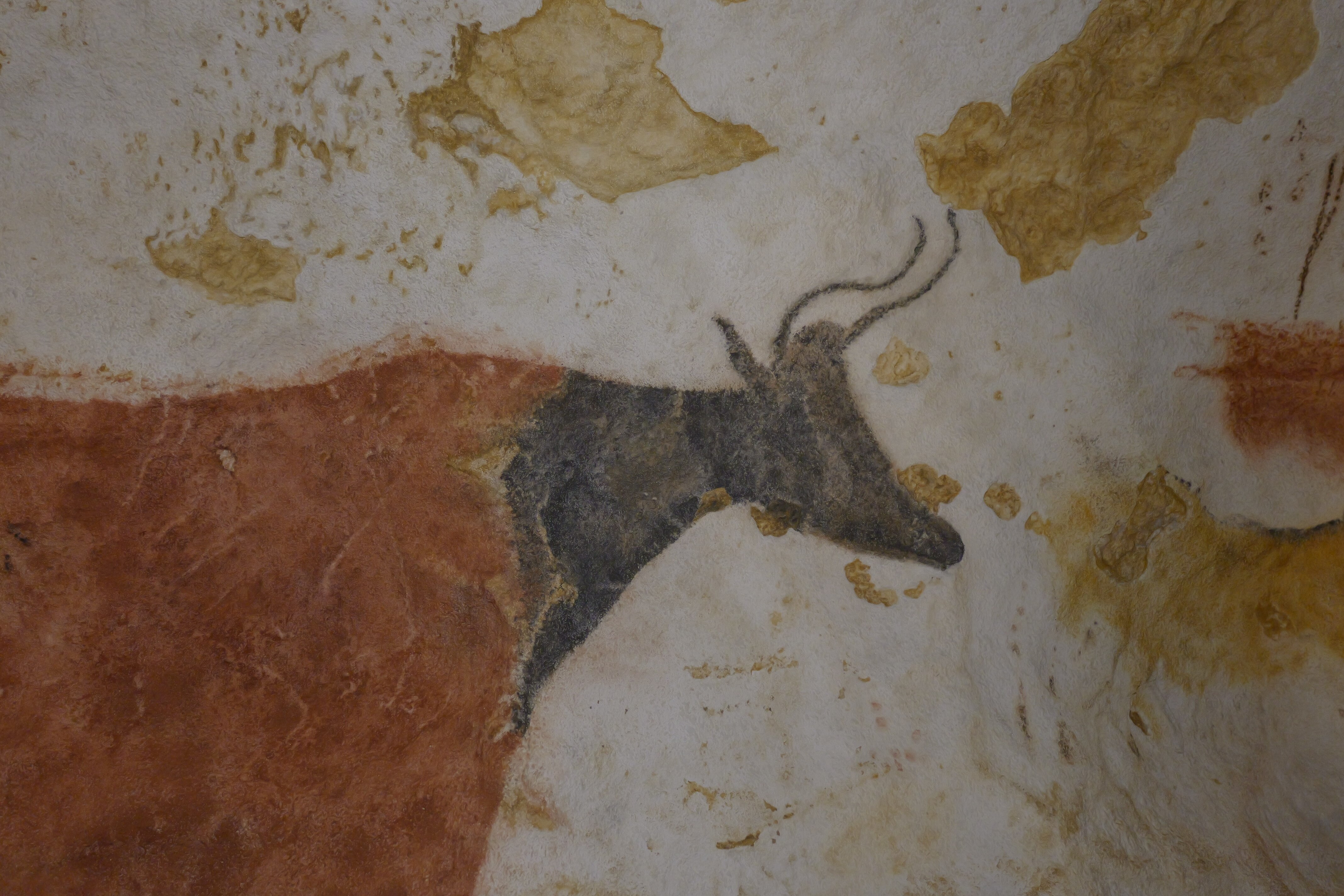 pintura de animal pré-histórico em uma caverna