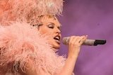 Kylie Minogue performs on  stage during her 2006 Showgirl: Homecoming Tour