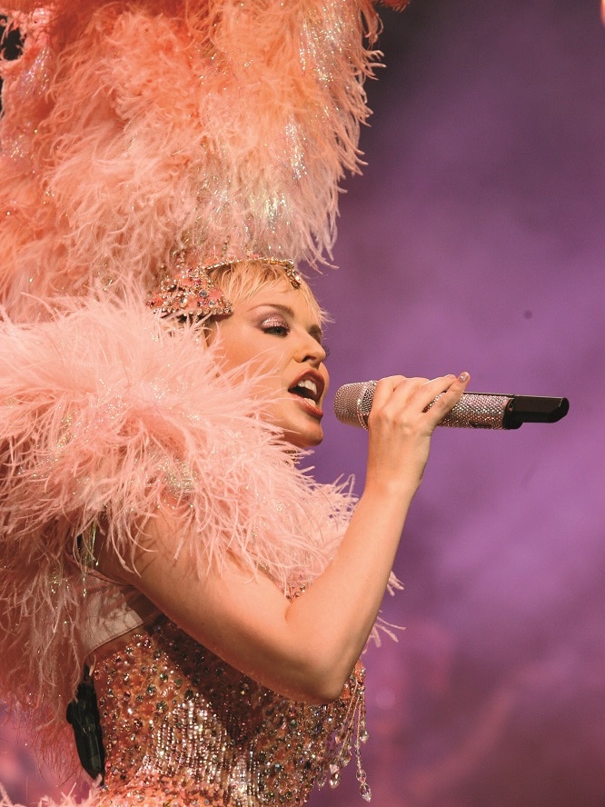 Kylie Minogue performs on  stage during her 2006 Showgirl: Homecoming Tour