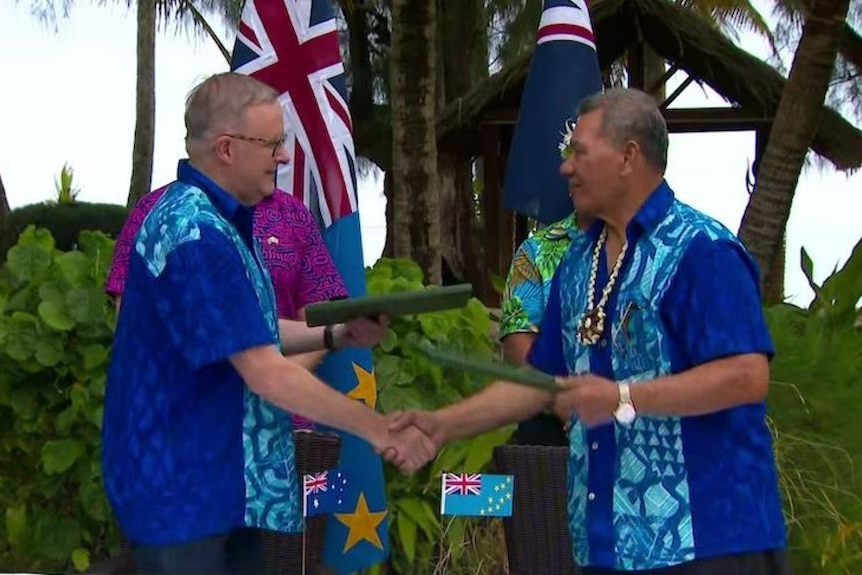 Anthony Albanese and Tuvalu's then Prime Minister Kausea Natano after signing the deal