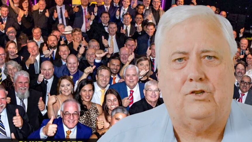 Clive Palmer speaking in front of a still of supporters in a 2019 United Australia Party television election ad