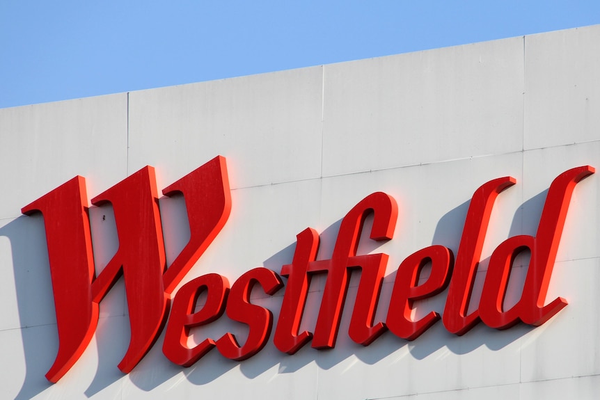 Westfield sign on the side of a Westfield shopping centre.