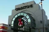 The exterior of Chadstone Shopping Centre with a Christmas wreath hanging as decoration on it.