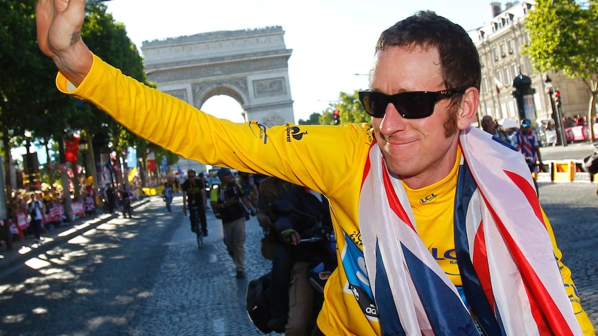 Sky's Bradley Wiggins celebrates on the Champs Elysees after winning the Tour de France in 2012.