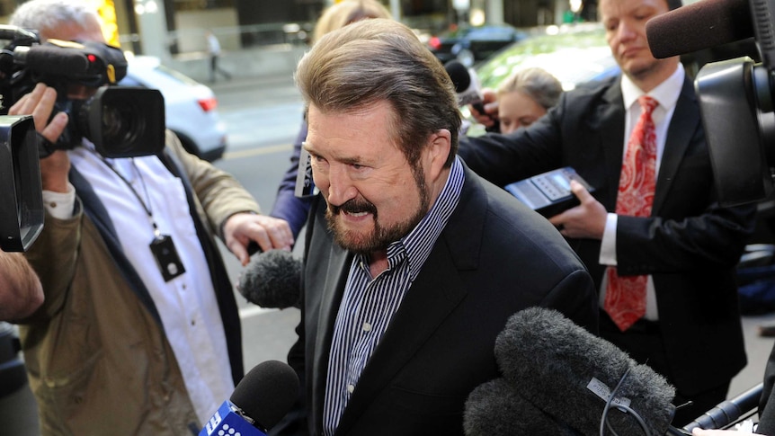 Derryn Hinch arrives at the Supreme Court in Melbourne on October 18, 2013