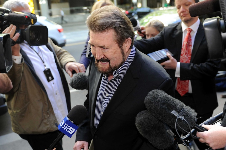 Derryn Hinch arrives at the Supreme Court in Melbourne on October 18, 2013